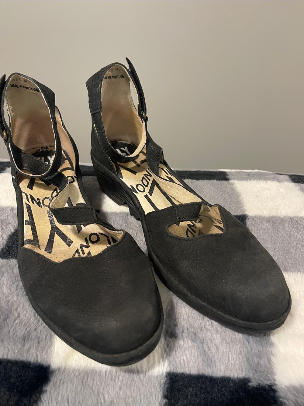 Fly London Black Leather Cutout Ankle-Strap Wedge Mules